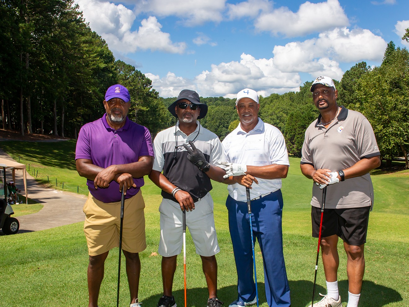 a foursome ready to tee off, Drive 4 Knowledge 2022